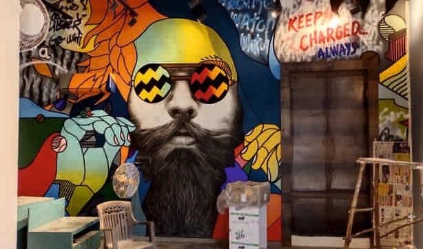 Colourful graffiti portrait at a private property in Jaipur