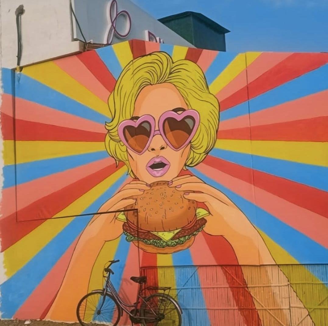 Pop-art wall painting at Pink Adarak restaurant